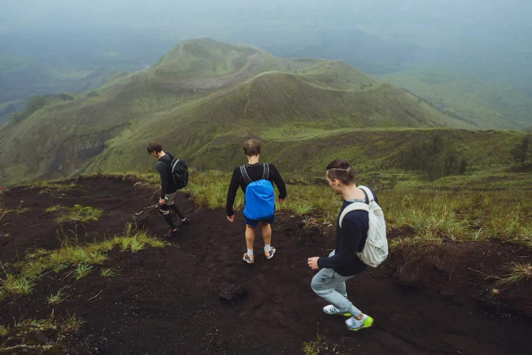 Narrow volcanic trail trekking down Mount Batur Bali