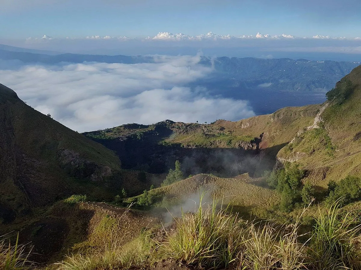 Volcanic crater rim view from top of Mount Batur Bali